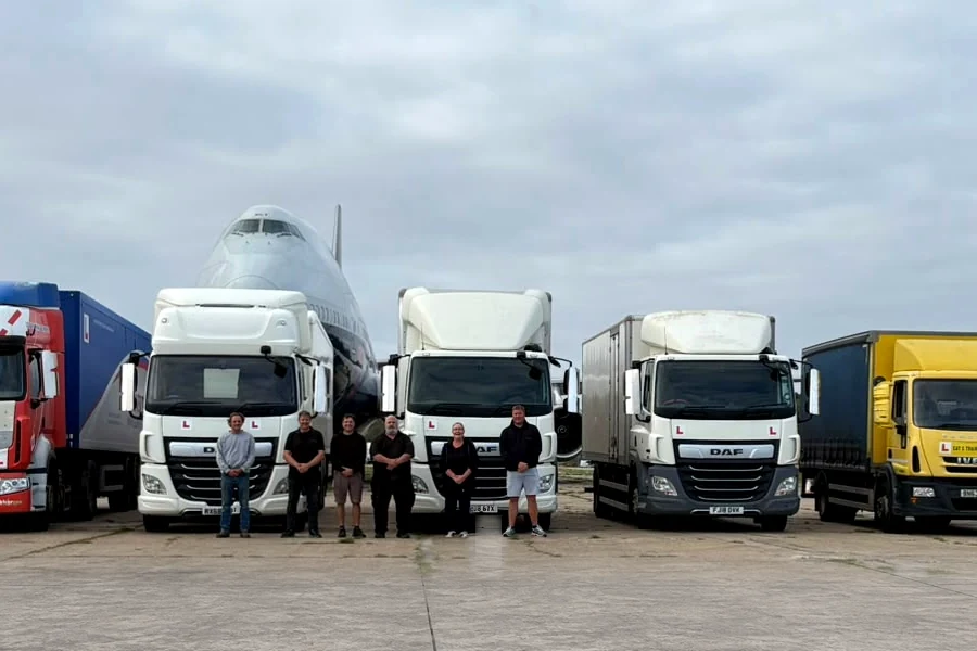 Members of the GS Driver Training instructor team with the training fleet at Dunsfold Aerodrome